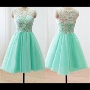 This dress is a mint handmade lace dress
